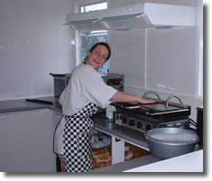 Cleaning down after a long day over a hot stove